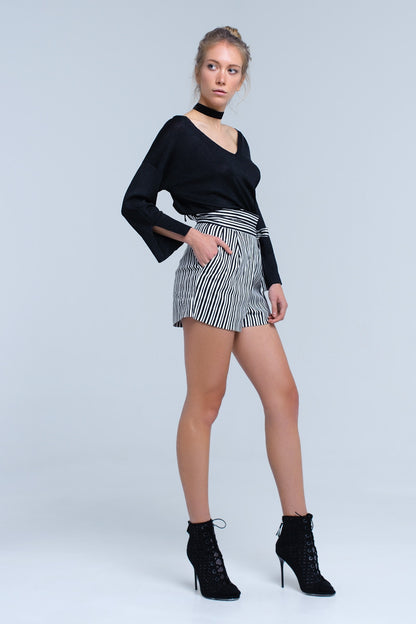 Jersey de punto negro con detalle de lurex dorado