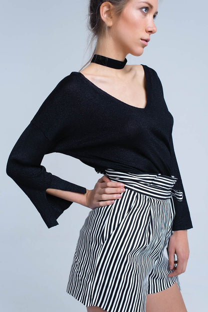 Jersey de punto negro con detalle de lurex dorado