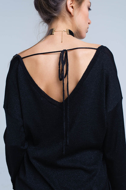 Jersey de punto negro con detalle de lurex dorado