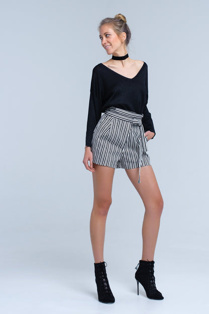 Jersey de punto negro con detalle de lurex dorado