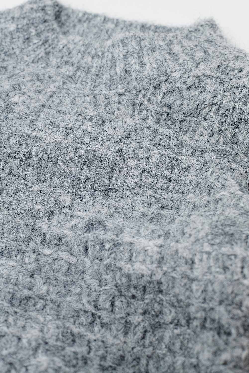 Jersey de punto oversize gris con mangas globo