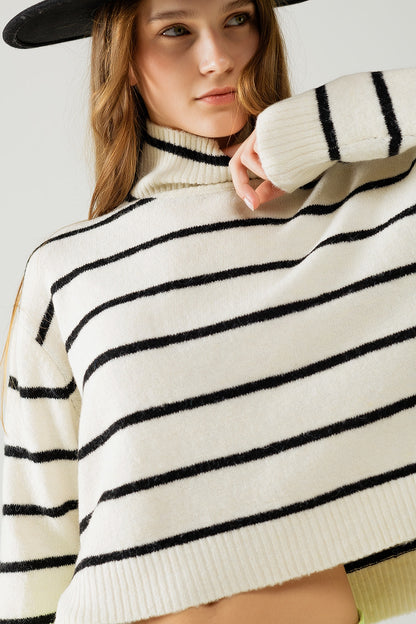 Q2 Jersey de rayas crema en negro con cuello alto