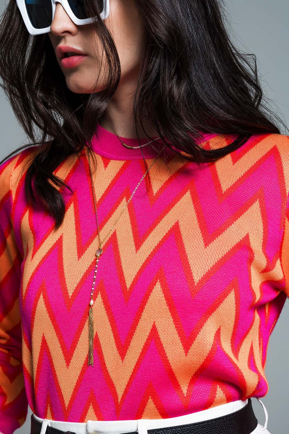 Jersey fucsia con estampado en zig zag con detalles naranjas