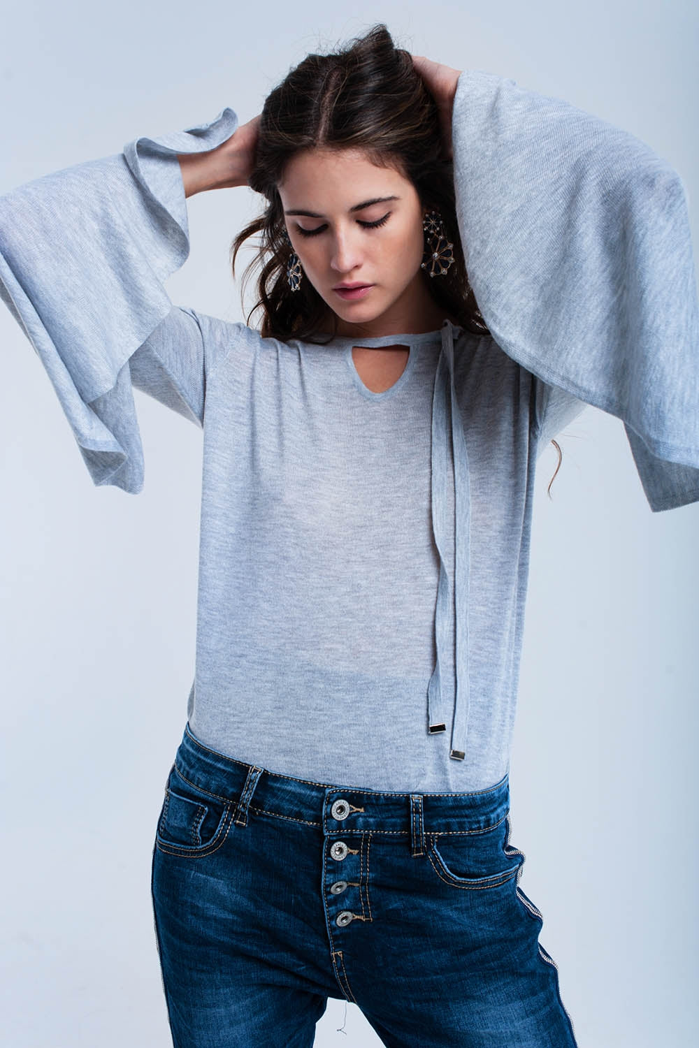 Jersey gris con manga de campana