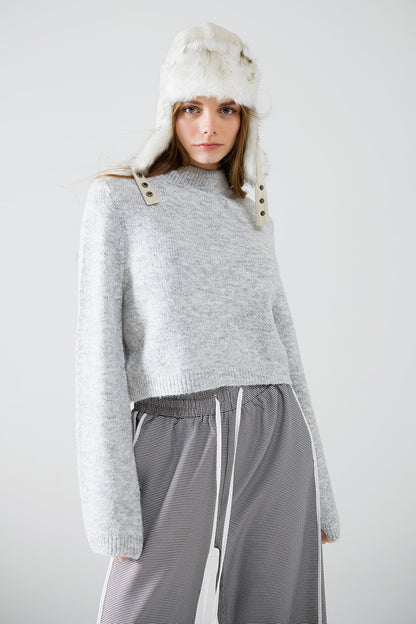 Jersey gris de manga larga con detalle de espalda abierta