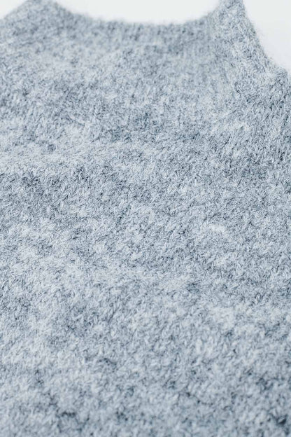 Jersey gris esponjoso con cuello alto y mangas globo