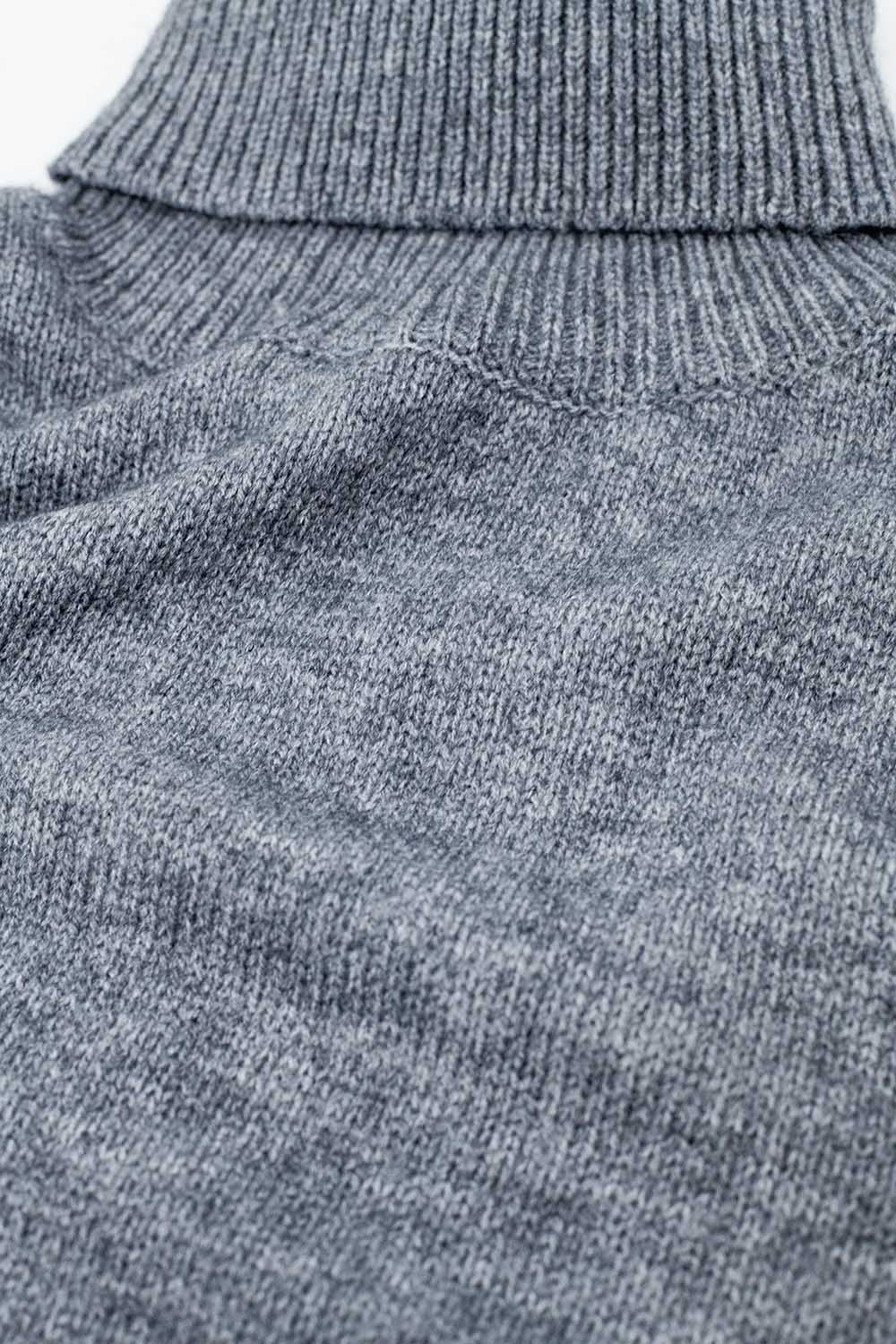 Jersey gris holgado con mangas caídas