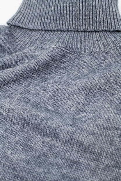 Jersey gris holgado con mangas caídas