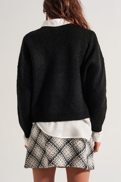 Jersey negro con cuello subido de punto