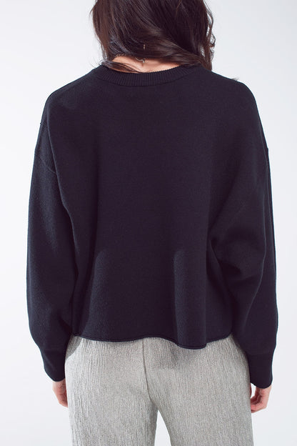 Jersey oversize con cuello barco en negro