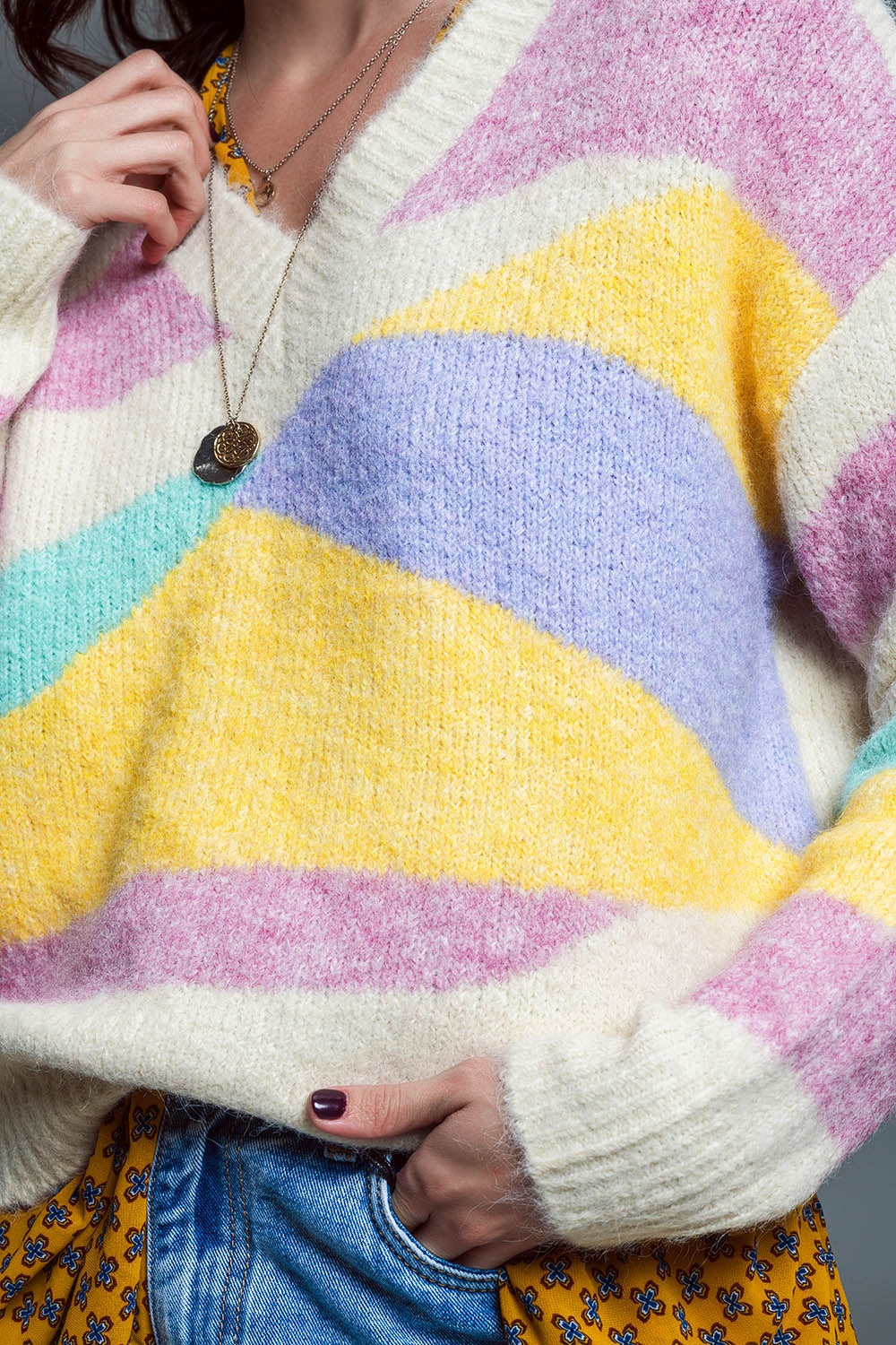 Jersey relajado con escote en V Beige con rayas abstractas en colores pastel