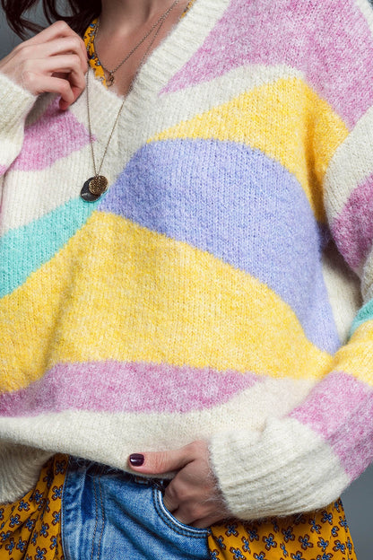 Jersey relajado con escote en V Beige con rayas abstractas en colores pastel