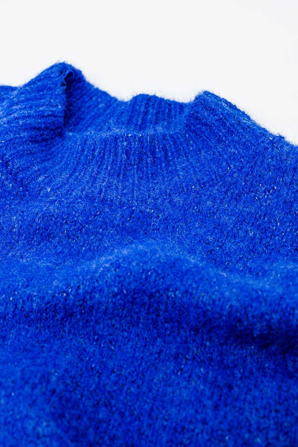 Jersey relajado con manga francesa y cuello redondo en azul tinta