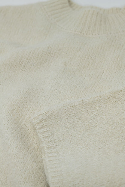 Jersey Relaxed de manga 3/4 y cuello redondo en color crema