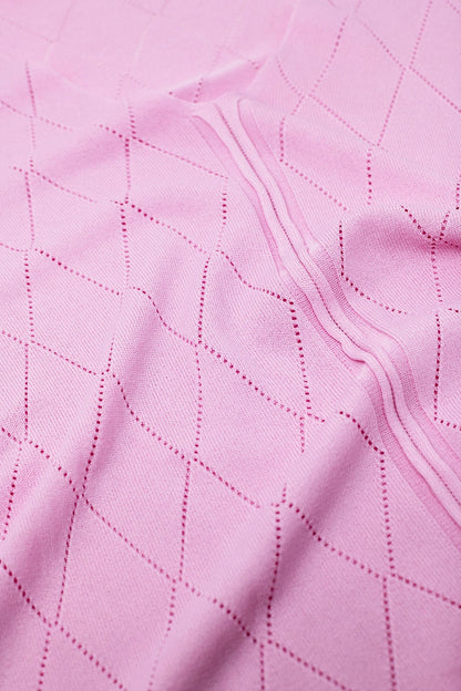 Jersey rosa claro de manga corta con estampado de rombos