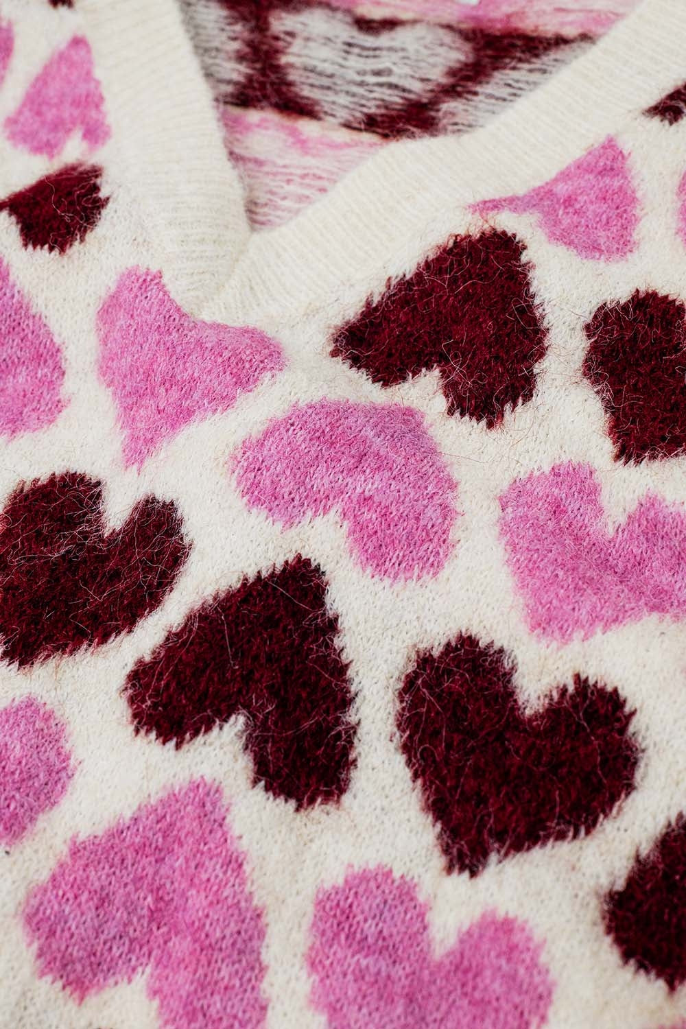 jersey suave en crudo con corazones rosas