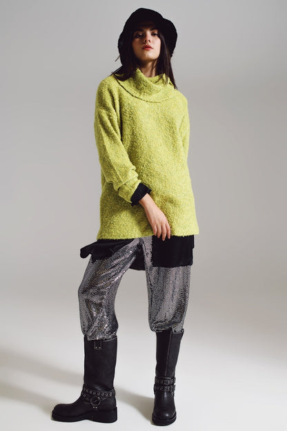 Jersey verde con cuello bardot.