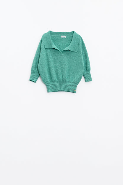 Jersey verde con mangas 3/4 y cuello de polo