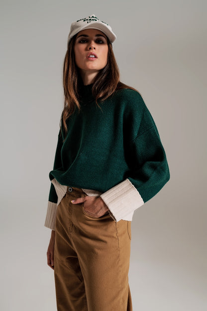 Jersey verde con puños y dobladillo blanco en canalé
