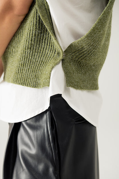 Jersey verde sin mangas de cuello alto con cierre de cremallera