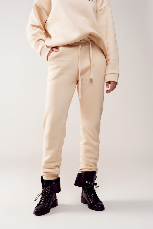 Q2 Jogger de algodón en color crema