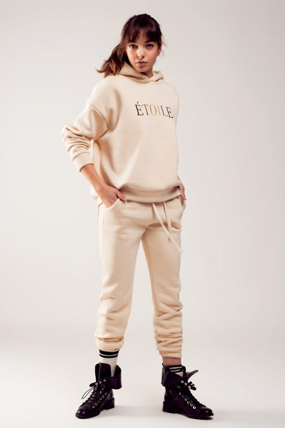 Jogger de algodón en color crema