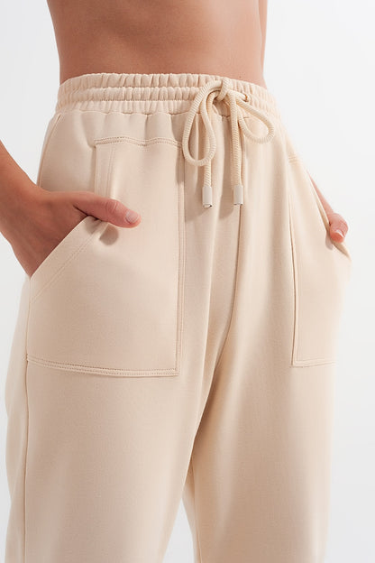 Joggers con cintura elástica en beige
