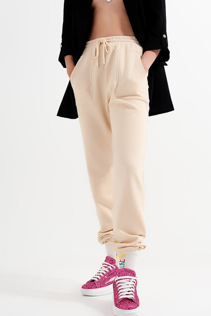 Joggers con cintura elástica en beige