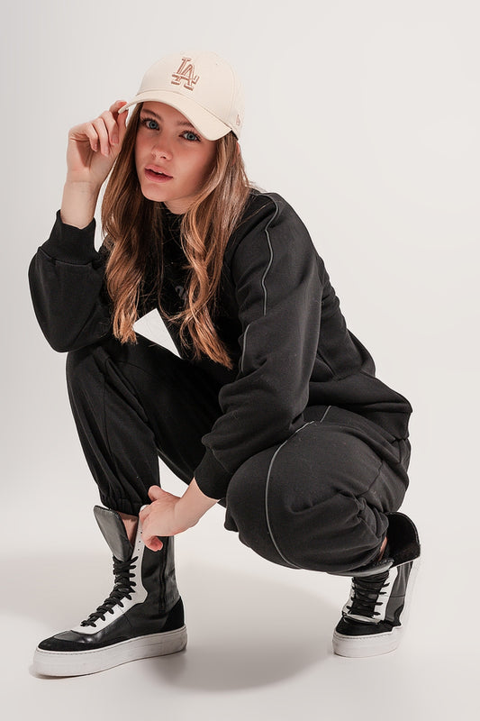 Q2 Joggers negros con cordón ajustable en la cintura y costura delantera