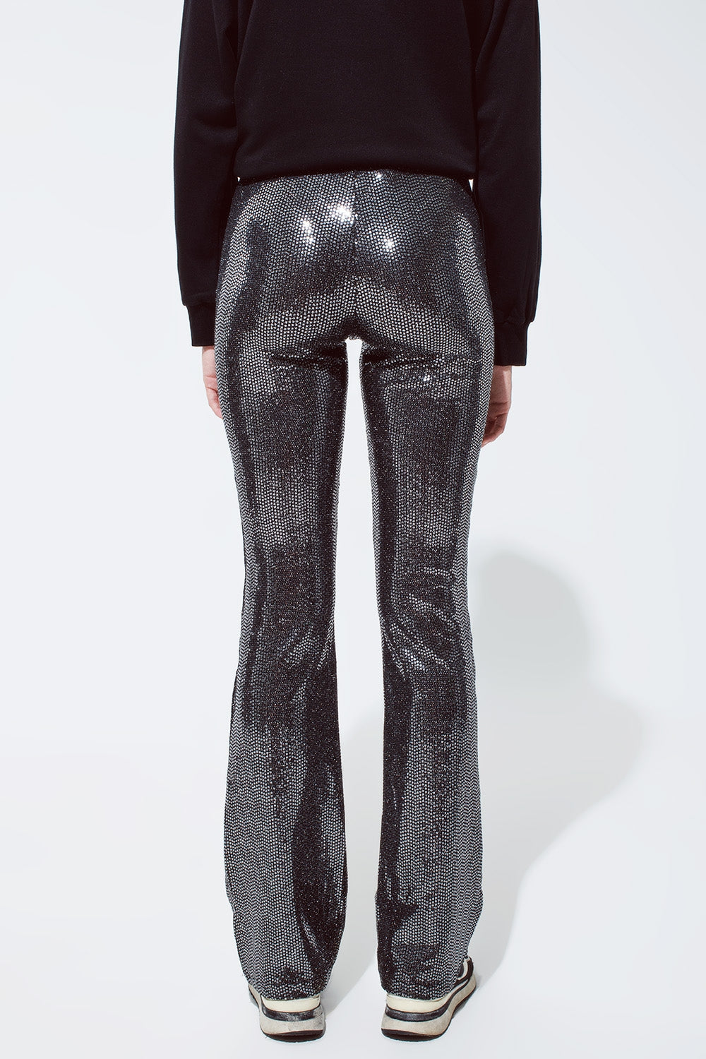 Leggings acampanados de tejido metalizado en plata
