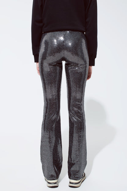 Leggings acampanados de tejido metalizado en plata