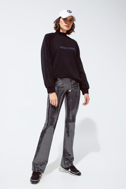 Leggings acampanados de tejido metalizado en plata