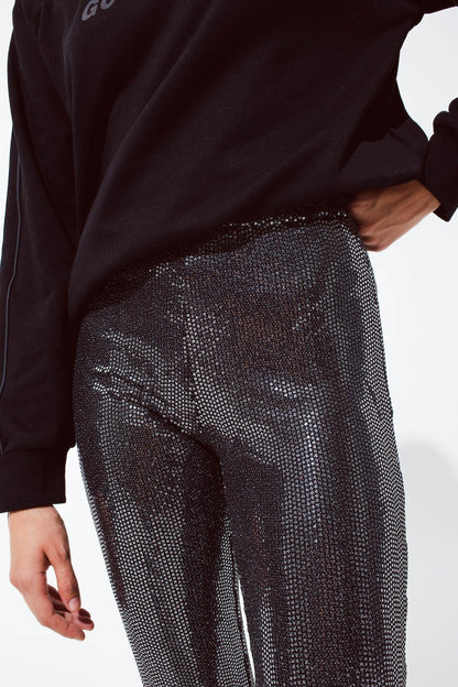 Leggings acampanados de tejido metalizado en plata