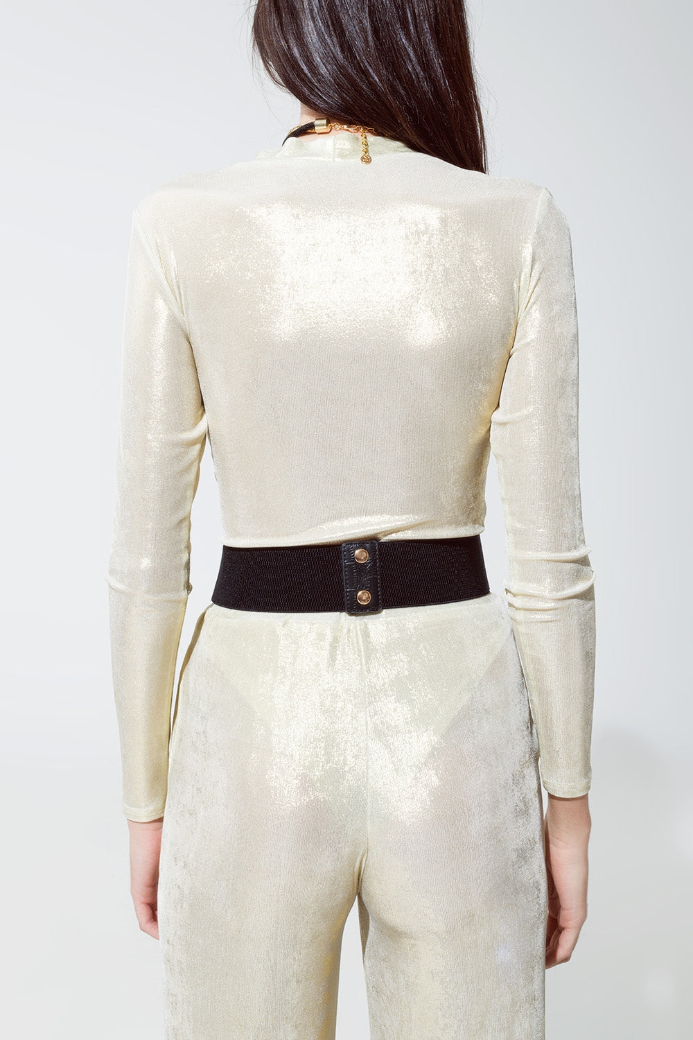 Leggings con acabado metalizado en blanco perla.