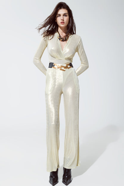 Leggings con acabado metalizado en blanco perla.