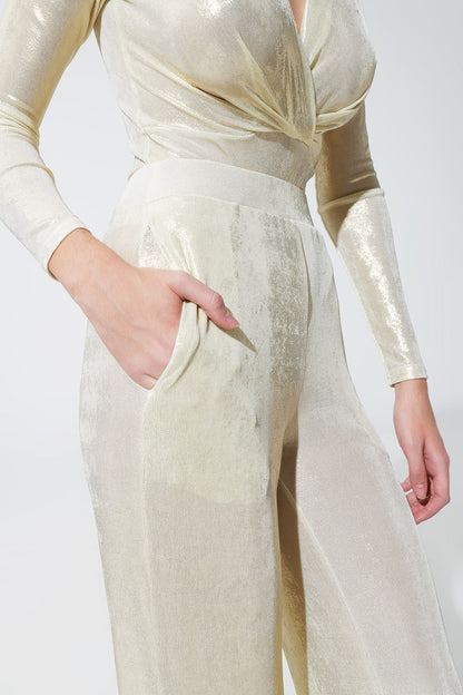 Leggings con acabado metalizado en blanco perla.