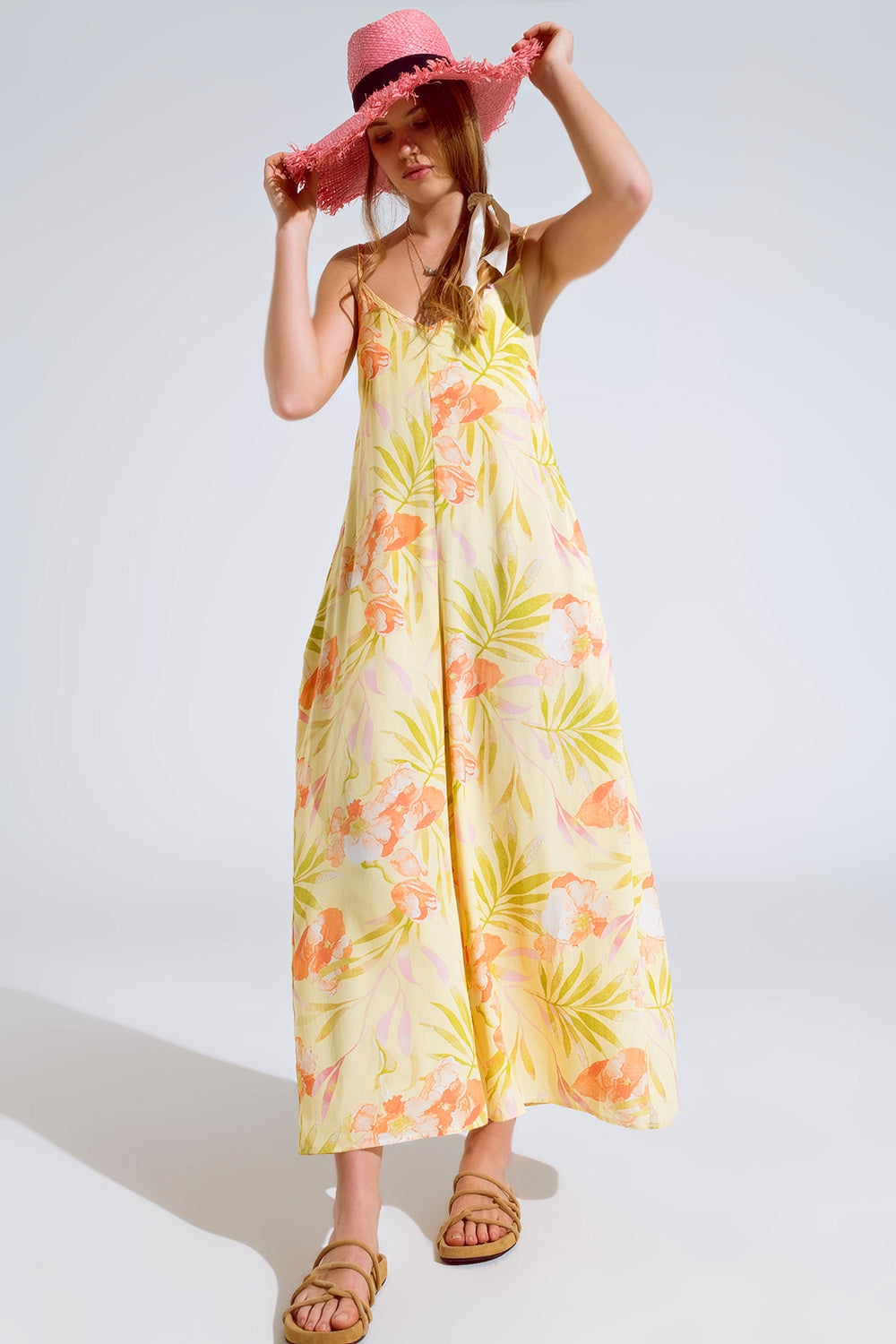 maxi mono amarillo con estampado tropical