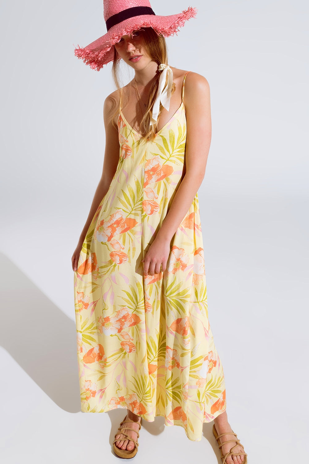 maxi mono amarillo con estampado tropical
