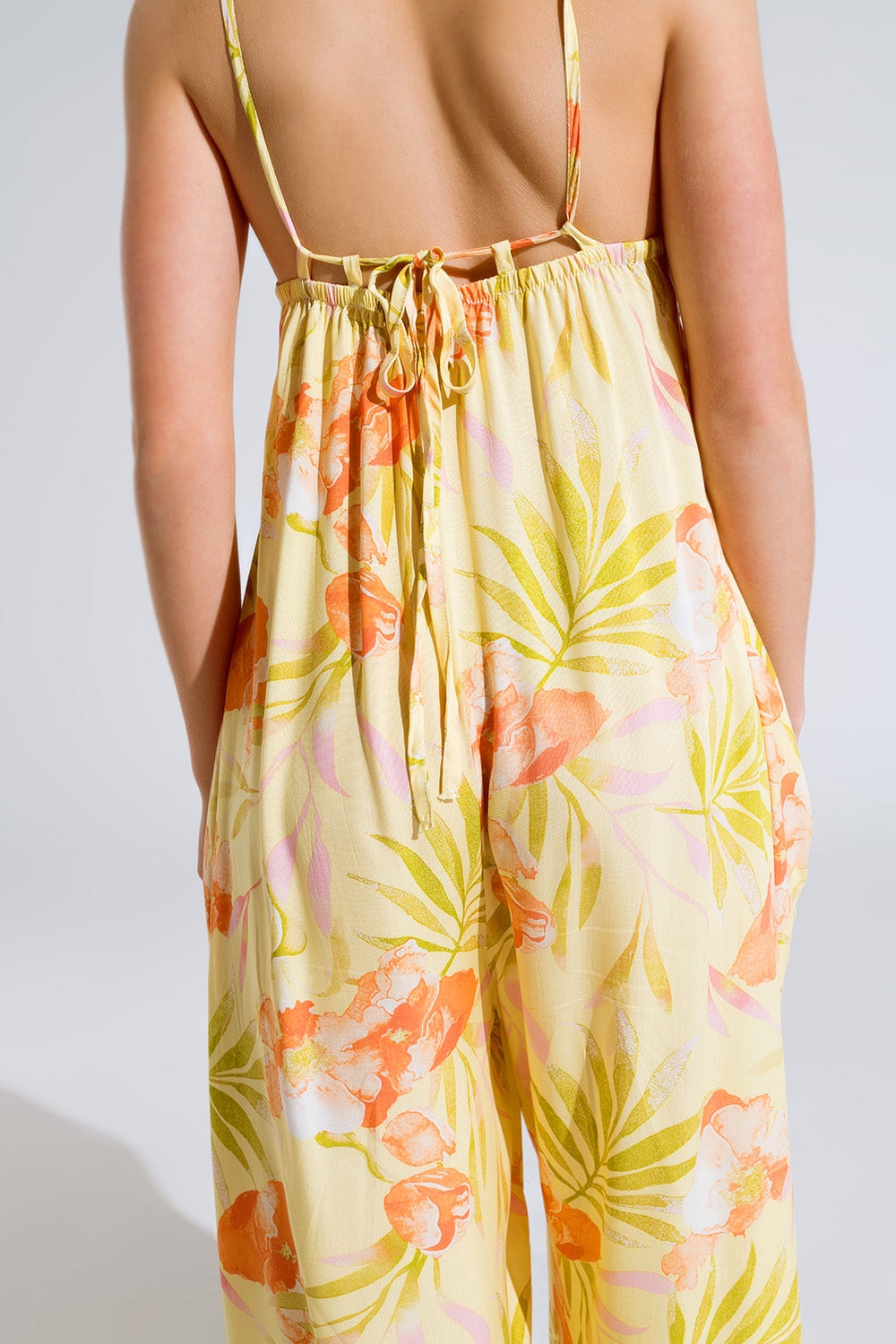 maxi mono amarillo con estampado tropical