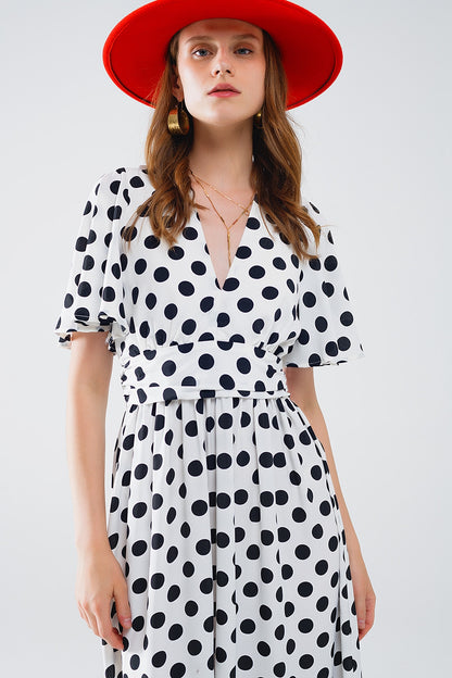 Maxi vestido de lunares con detalle de espalda abierta