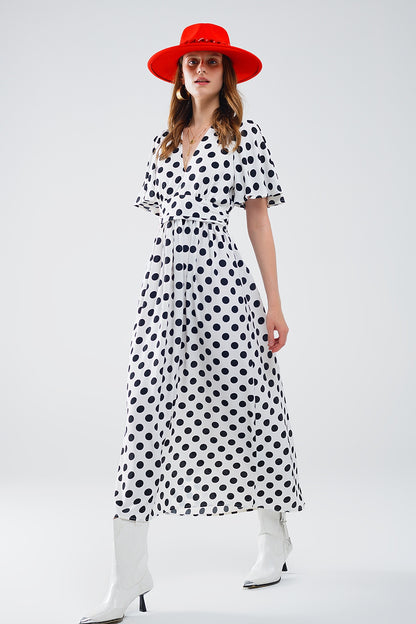 Maxi vestido de lunares con detalle de espalda abierta