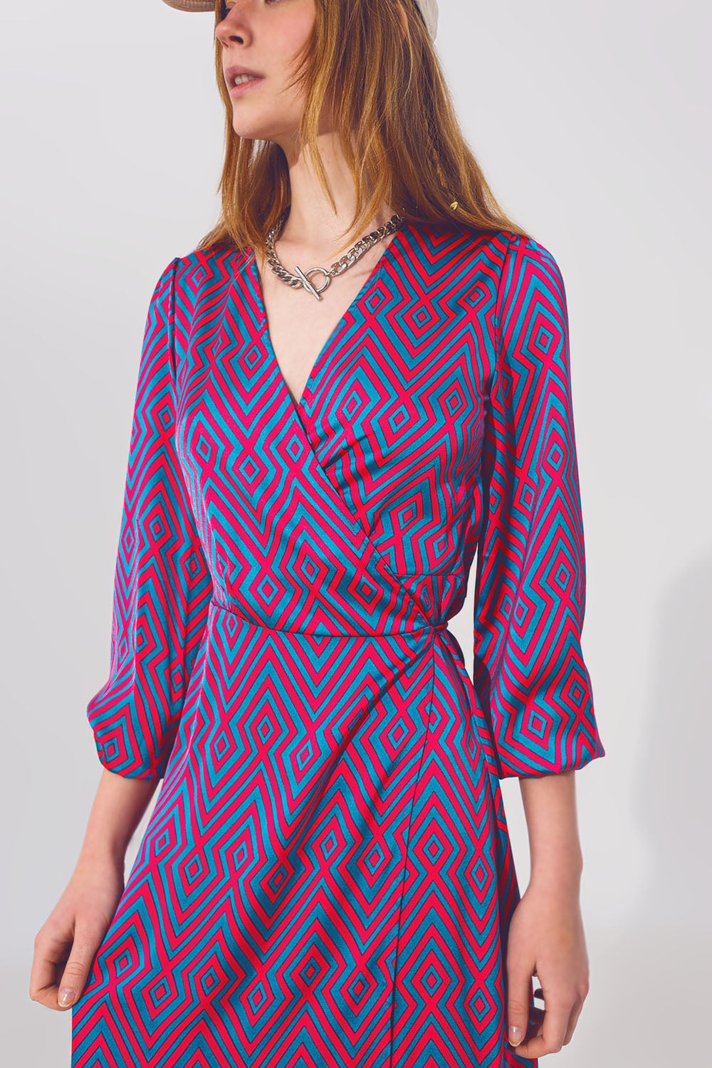 Maxivestido de manga larga con estampado geométrico