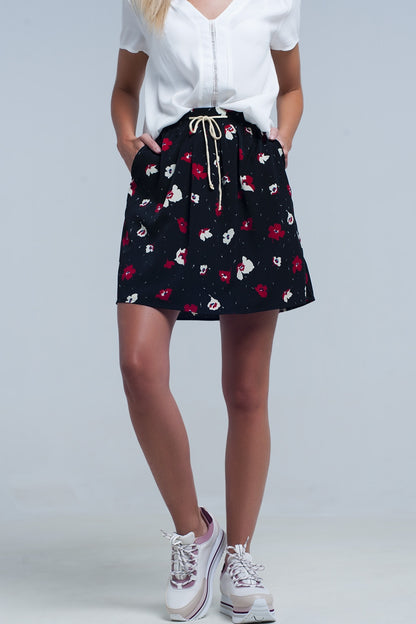 Mini falda negra con estampado de flores