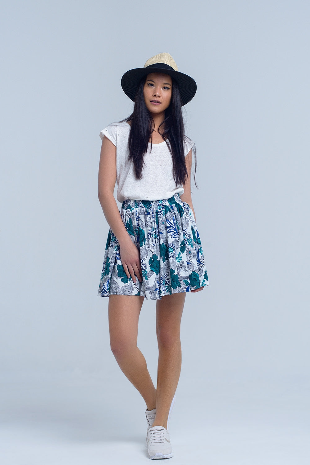 Mini falda pantalon azul con estampado floral