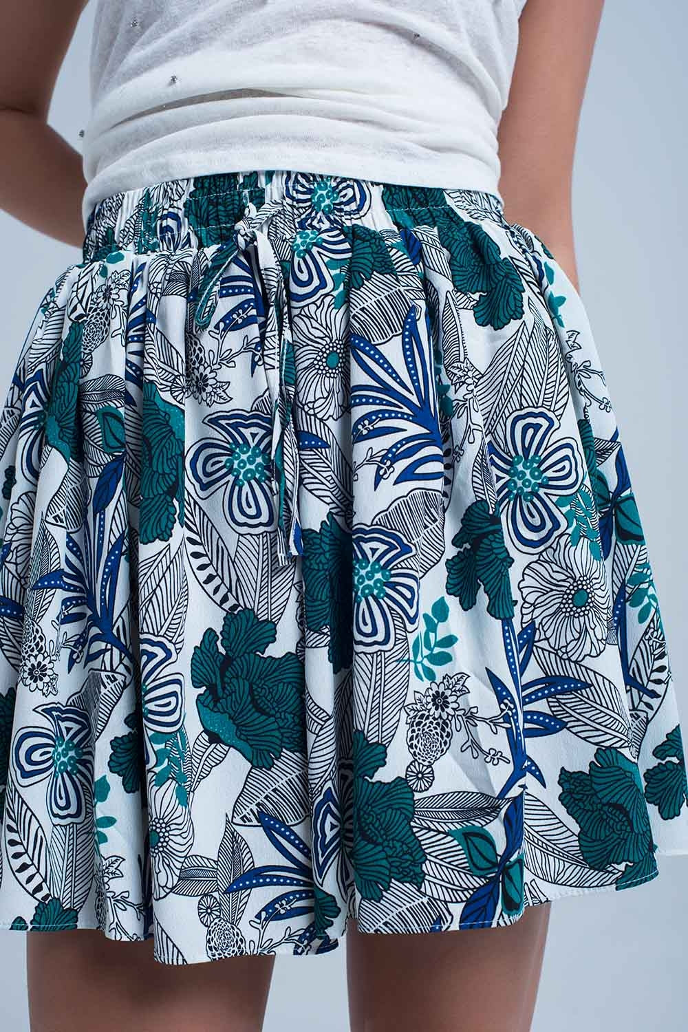 Mini falda pantalon azul con estampado floral