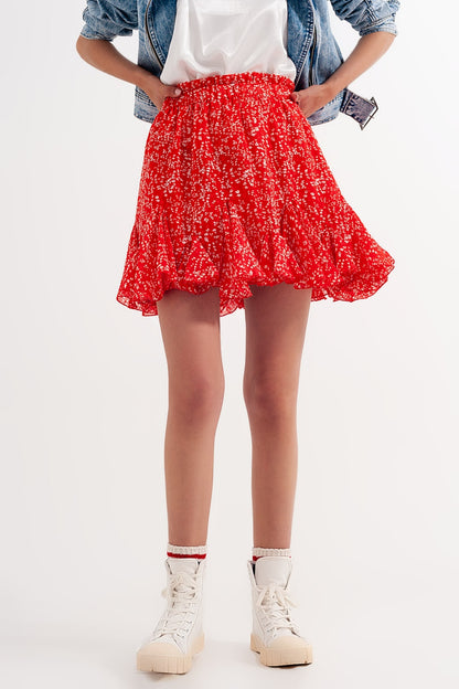 Minifalda roja con estampado floral y volantes