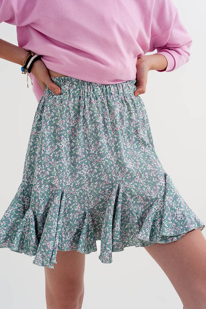 Minifalda verde con estampado floral y volantes