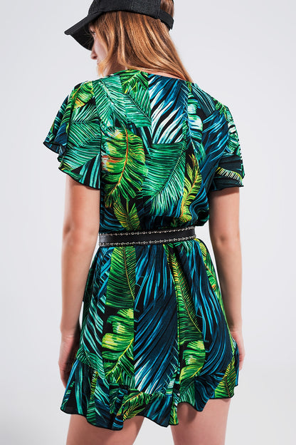 Mono corto verde cruzado con estampado hojas tropicales