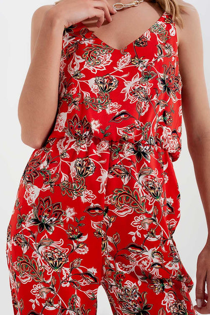 Mono largo con estampado floral y tirantes finos en rojo
