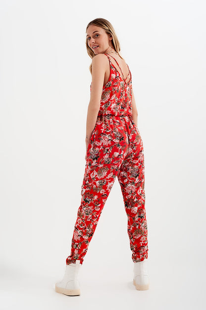Mono largo con estampado floral y tirantes finos en rojo